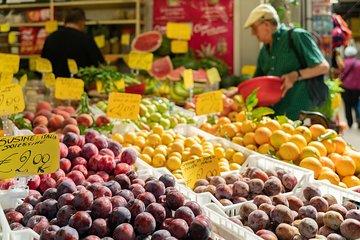 Local market visit and private cooking class at a Cesarina's home in Perugia