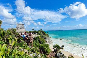 Half-day Tulum ruins and cenote swim arrive before the crowds