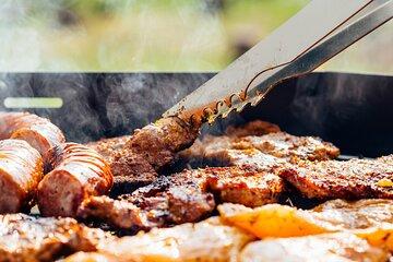 Dune Bashing Quad Biking and Camel Riding with BBQ Meal