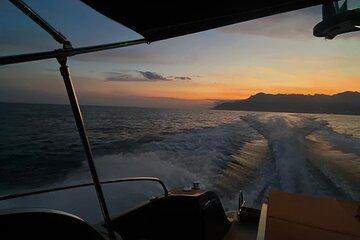 Sunset on a boat on the Amalfi Coast