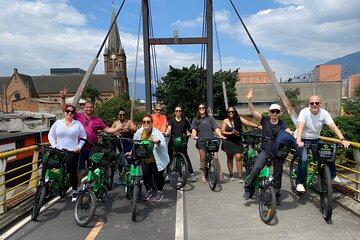Explore Medellín by Bike: The Ultimate City with a local drink .