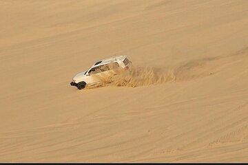 Doha: Inland Sea Desert Safari with Camel Ride & Dune Bashing