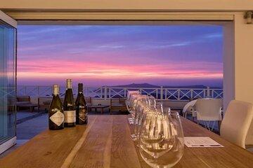 Roundtrip transfer to Santo Winery from your hotel