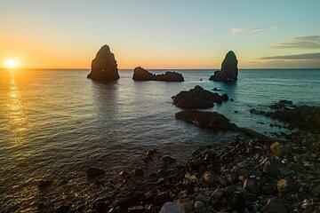 Sunset from Aci Castello Coastal Beauty and Lava Cliffs