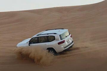 Evening Desert Safari Dubai Dune Bashing Camel Ride and BBQDinner