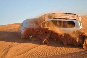 Dubai Desert Safari Dune Bashing, Camel Ride, and BBQ Dinner