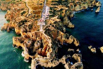 Walk at sunset in the caves DA Ponta DA Piedade 1H30M