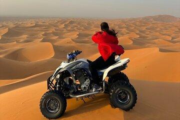 Abu Dhabi Desert Safari with Quad Bike, Camel Ride, & BBQ Dinner