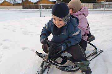Play in the snow with the locals