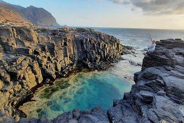 Explore Black Sand Beach and the Incredible Natural Pool
