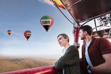 Luxury Sunrise Balloon Flight with Desert Breakfast and Falconry
