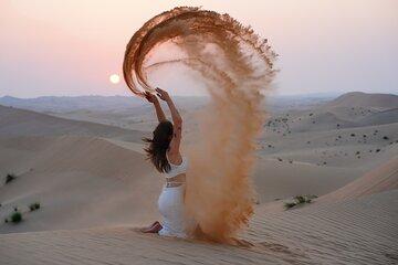 Short Desert Safari Tour with Camel Ride and Sand boarding