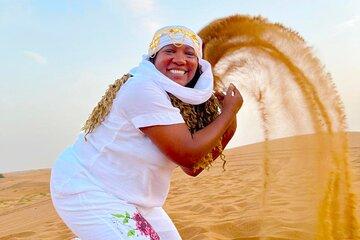 Abu Dhabi Desert Safari Dune Bashing Camel Ride and BBQ Buffet