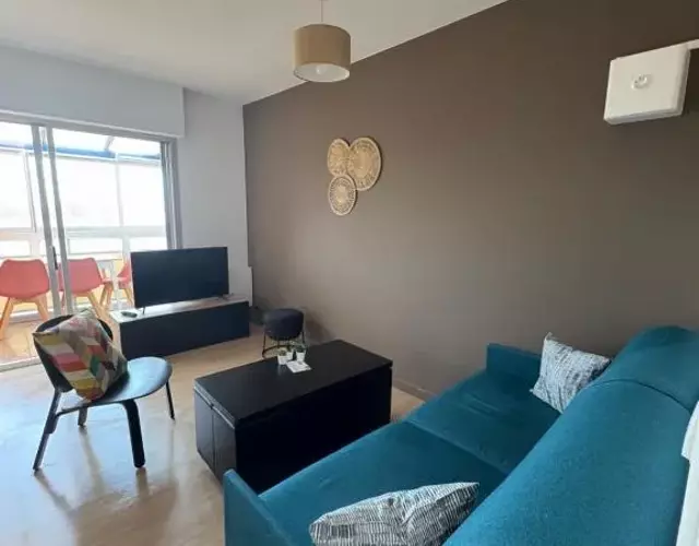 Appartement Cosy Parking, Plage & Commerces à Deux Pas