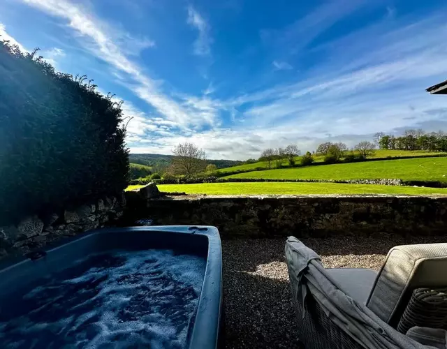 Romantic four poster Cottage private outdoor Hot Tub & Sauna at Harthill Hall plus private daily use of indoor pool and sauna 1 hour per day