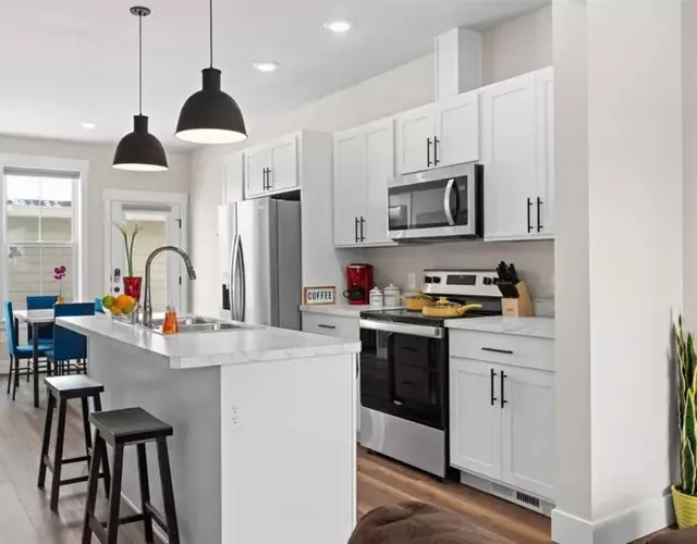 Crash With Class In This Townhome