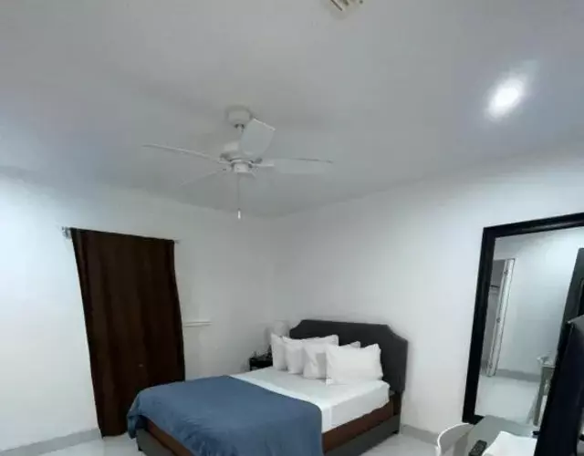 bedroom with sharing bathroom