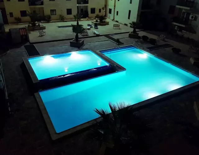 Bugibba Deluxe Penthouse with terrace & communal swimming pool