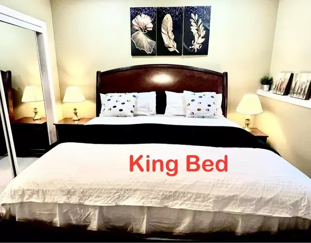 Cozy Walkout suite with King bed, Kitchen, Parking & Patio