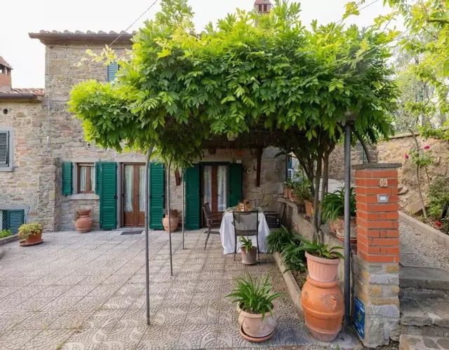 on a picturesque hillside, breathtaking views of Cortona