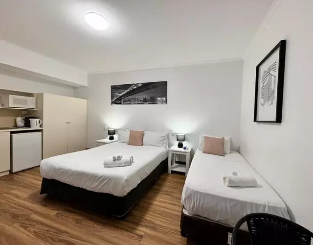 city staycation studio with 2 beds