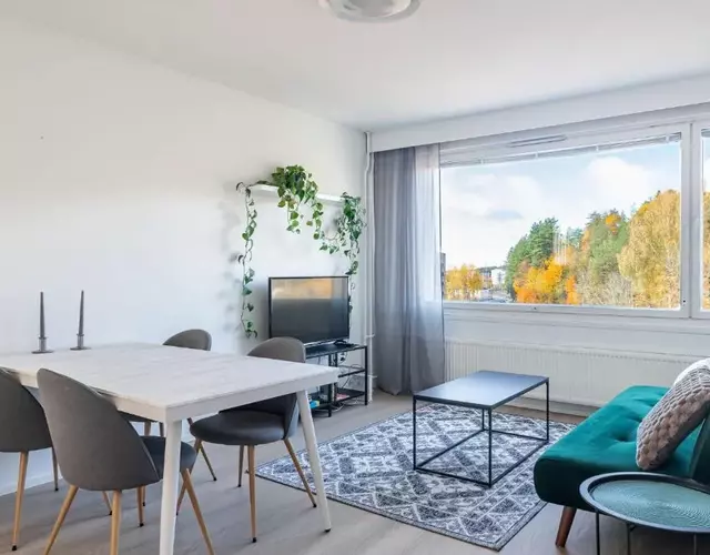Central 1BR Apartment with Balcony & Free Parking