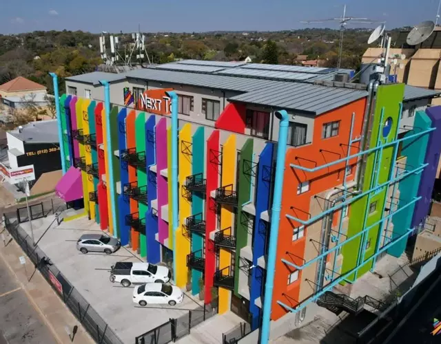 Next To Apartment Hotel