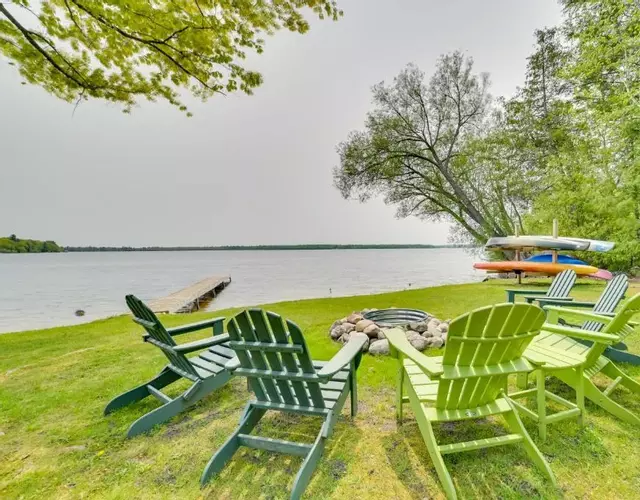 Cozy Carp Lake Cottage with Dock, Kayaks and Fire Pit