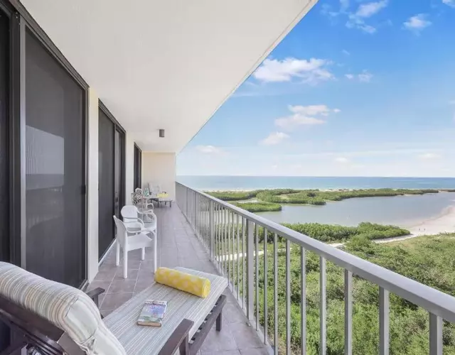 Beachfront condo with pool and ocean view from balcony
