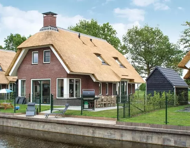 Villa in Friesland with Waterfront Jetty