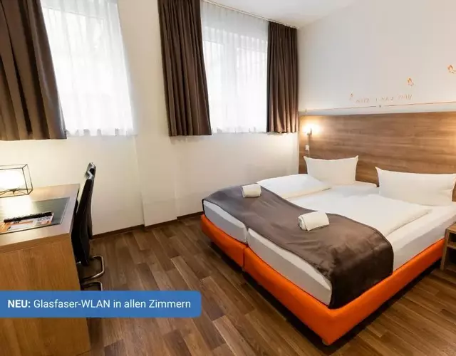 Orange Hotel und Apartments