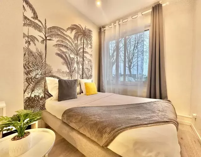 APPARTEMENT 2 chambres avec Jardinet, proche GARES