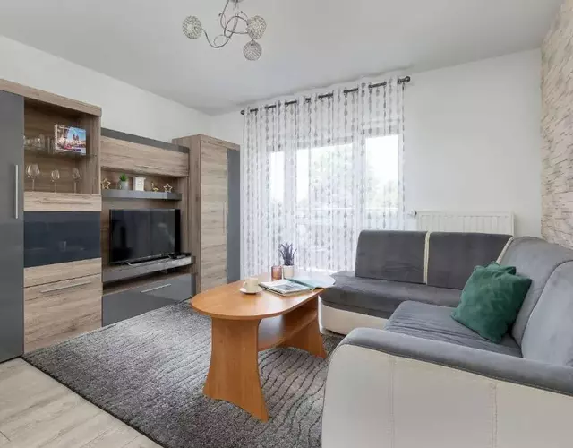 Modern Apartment with a Balcony in a Quiet Estate by Noclegi Renters