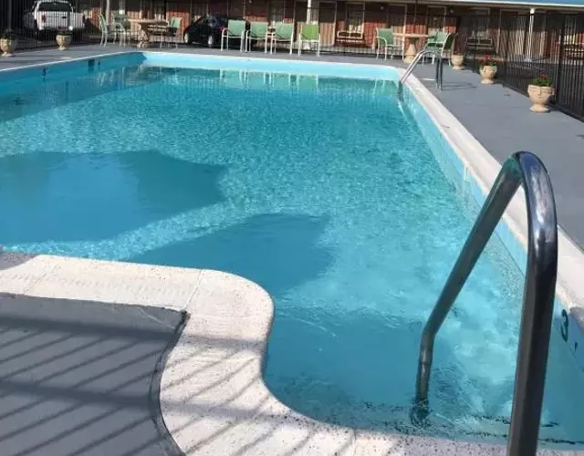 MERRIMAC INN & SUITES