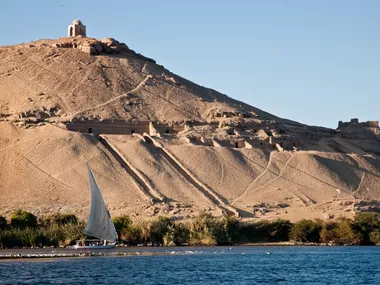 Generate a random place in Aswan