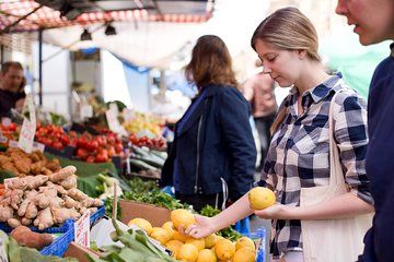 Local market visit and private cooking class at a Cesarina's home in Perugia