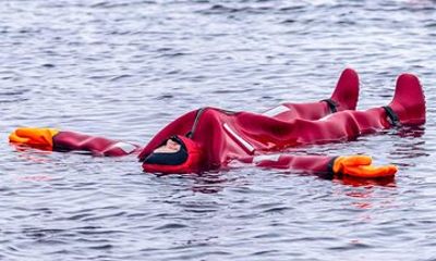 Dry-suit floating in Lake Saimaa