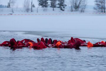 Dry-Suit Floating Experience in Lake Saimaa