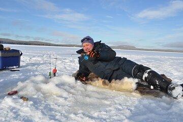 Ice fishing Day in Lapland