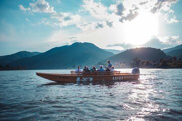 Wine tasting on traditional wooden boats in Wachau Valley