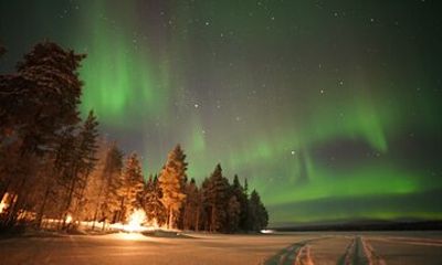 Northern Lights Picnic by the Lake in Rovaniemi Lapland Finland