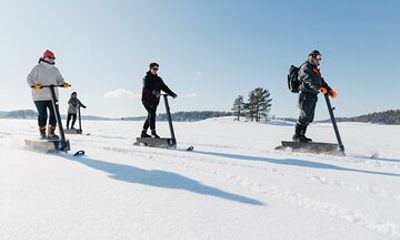 Private Driving Snow Scooters Experience in Finland