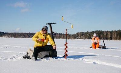 Private Electric Snow Scooter Safari and Ice Fishing in Puumala