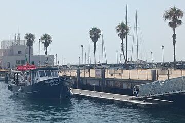 Cascais Coastal Secrets 90 Minute Cruise with Free Wine and Beer