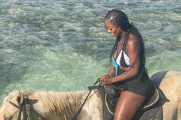 Dunn’s River Falls and Blue Hole Bamboo Rafting Zipline Horseback