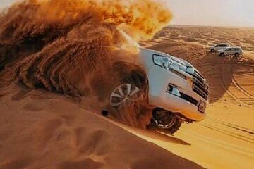 Abu Dhabi Desert Safari Dune Bashing, Camel Rides and Dinner