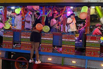 Chiva Rumbera Tour of Medellin with Party, Music and Open Bar