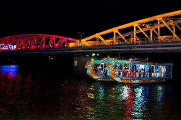 Cyclo Ride, Street Food, Folk Music on Perfume River Hue by Night