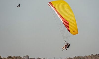 Coast, Mountains & Sunset Paragliding Experience