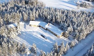 Ice Skating on a Lake with Reindeer Visit and Warm Drinks